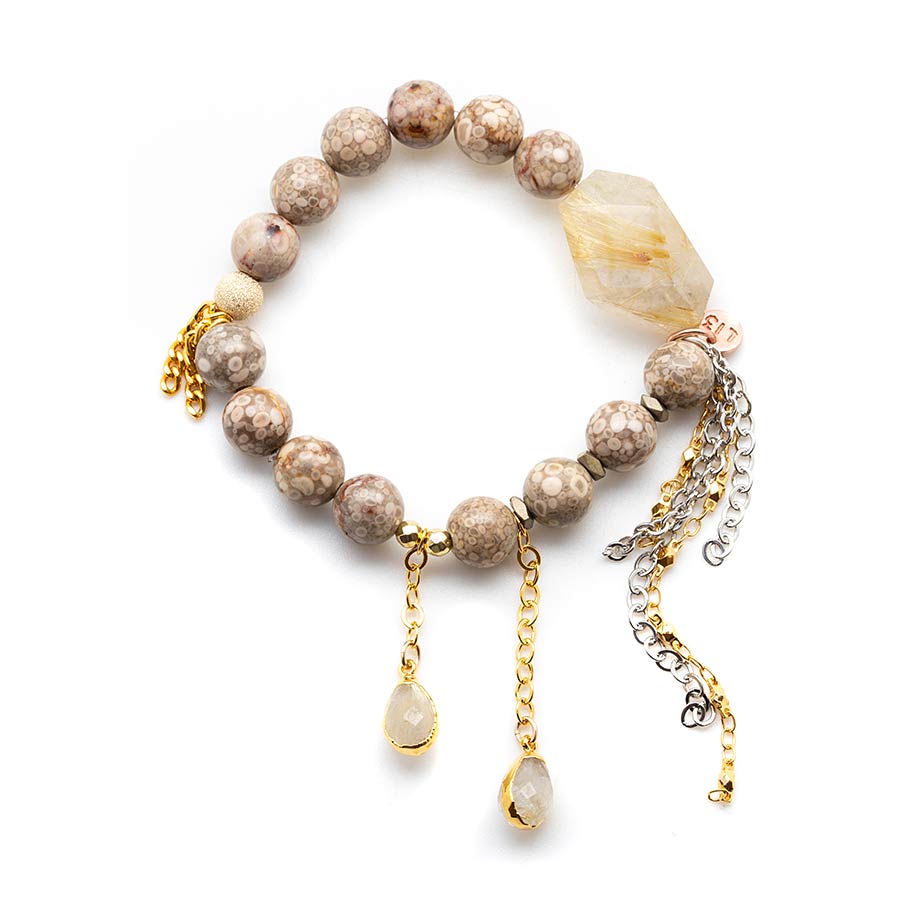 Coral with a Golden Rutilated Quartz Crystal Waterfall
