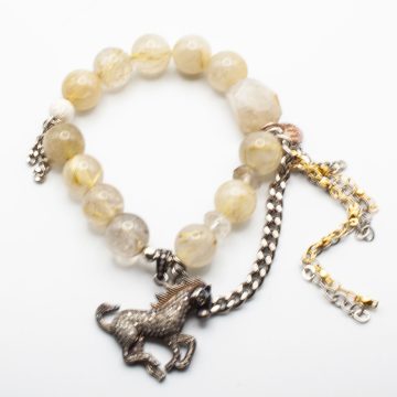 Golden Rutilated Quartz with a Diamond Horse